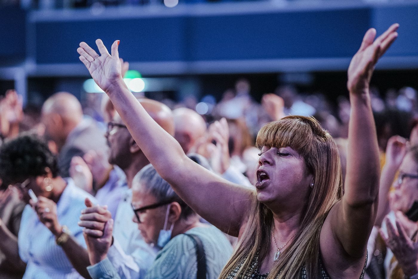 People singing together during a church service